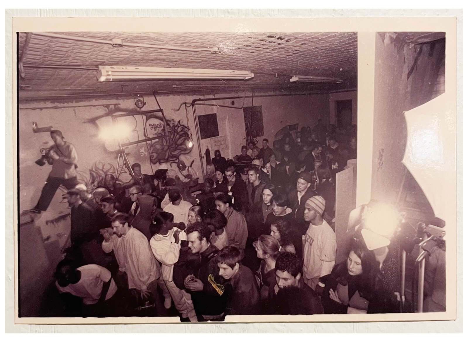 Skateboarding an indoor mini ramp